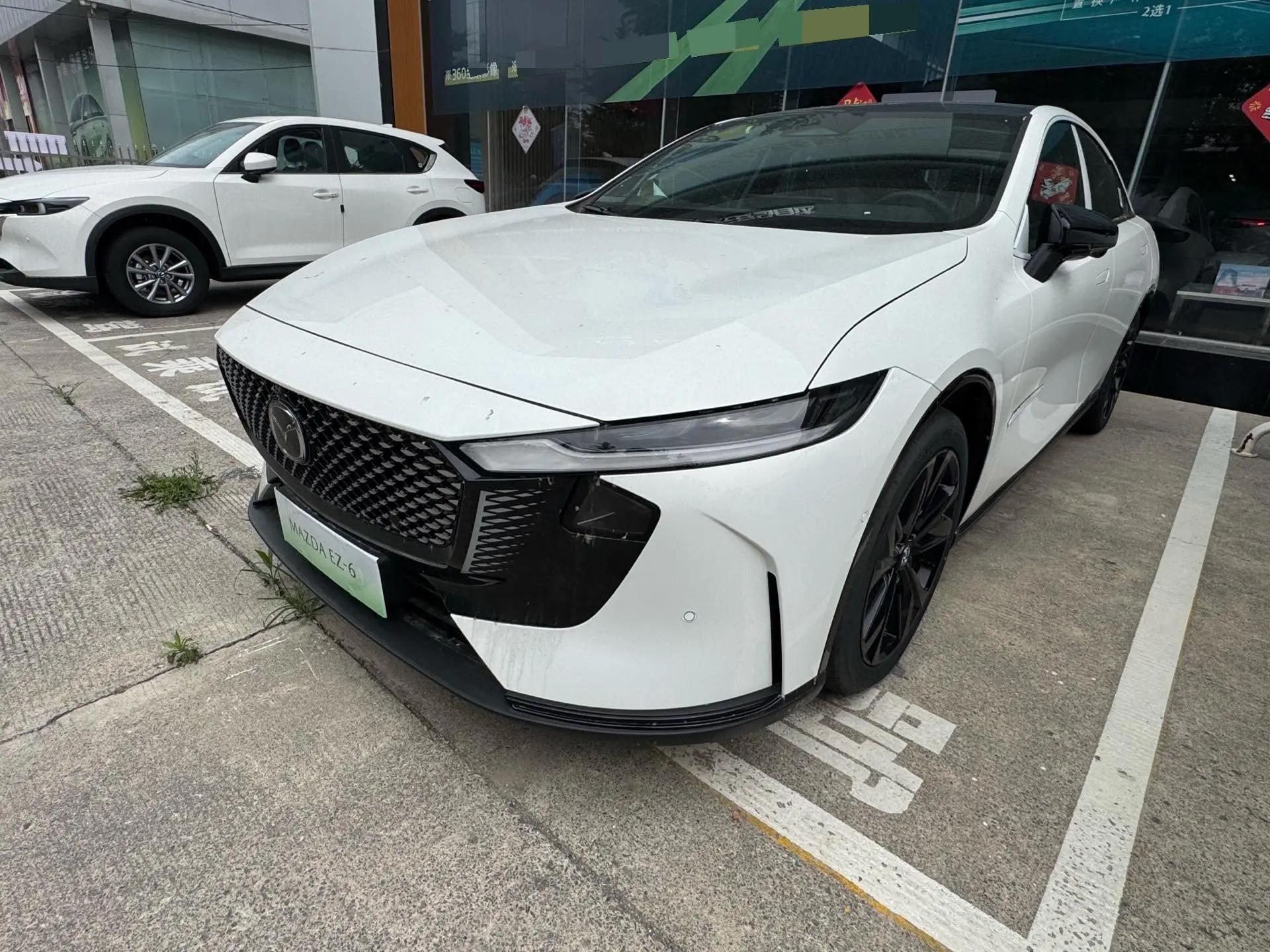 Открыть галерею: Mazda 2026 EZ-6 200 Pro Sports Edition Automatic Gear