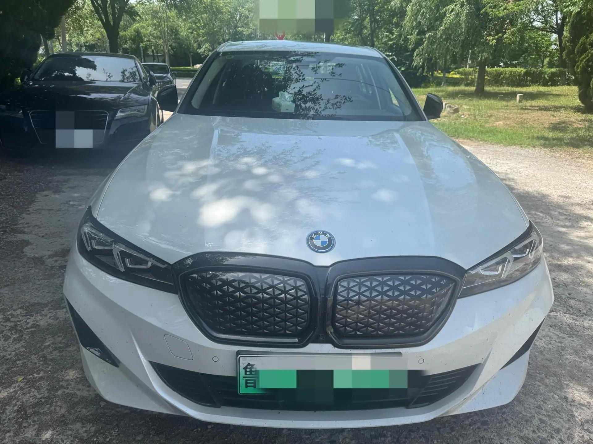 BMW 2025 i3 eDrive 40 L obsidian night suit automatic gear 2