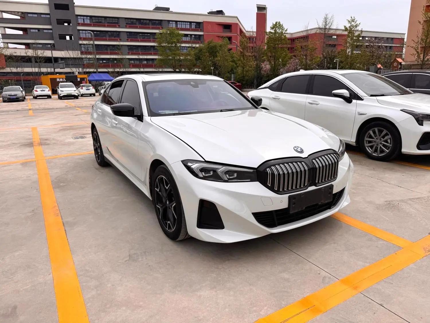 BMW 2023 i3 eDrive 40 L obsidian night suit automatic gear 2
