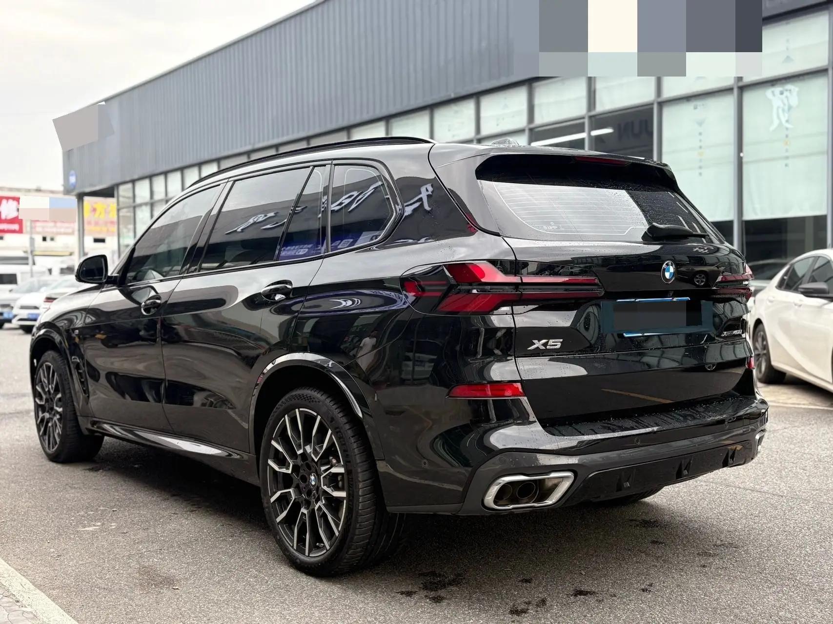 BMW 2023 X5 xDrive40Li 48V 3.0T M sports obsidian night suit automatic gear 11
