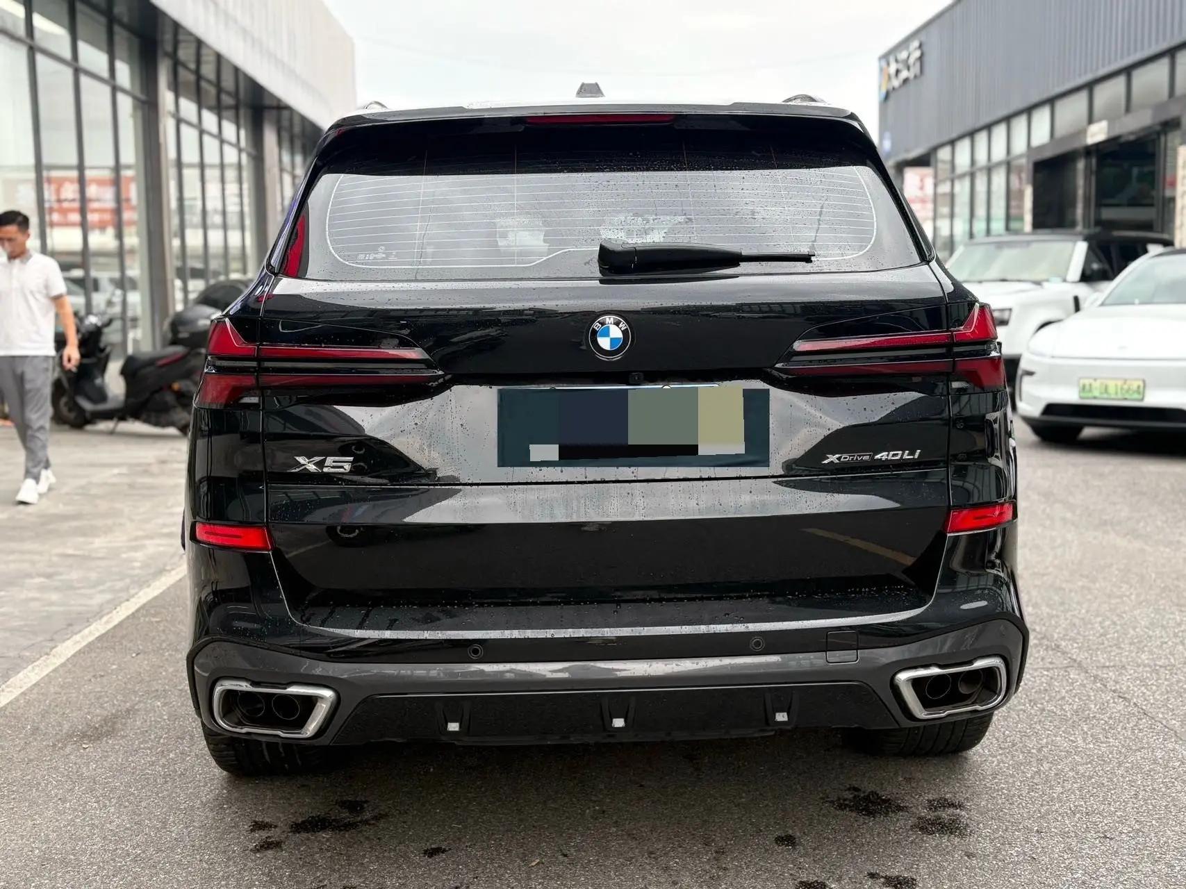BMW 2023 X5 xDrive40Li 48V 3.0T M sports obsidian night suit automatic gear 12