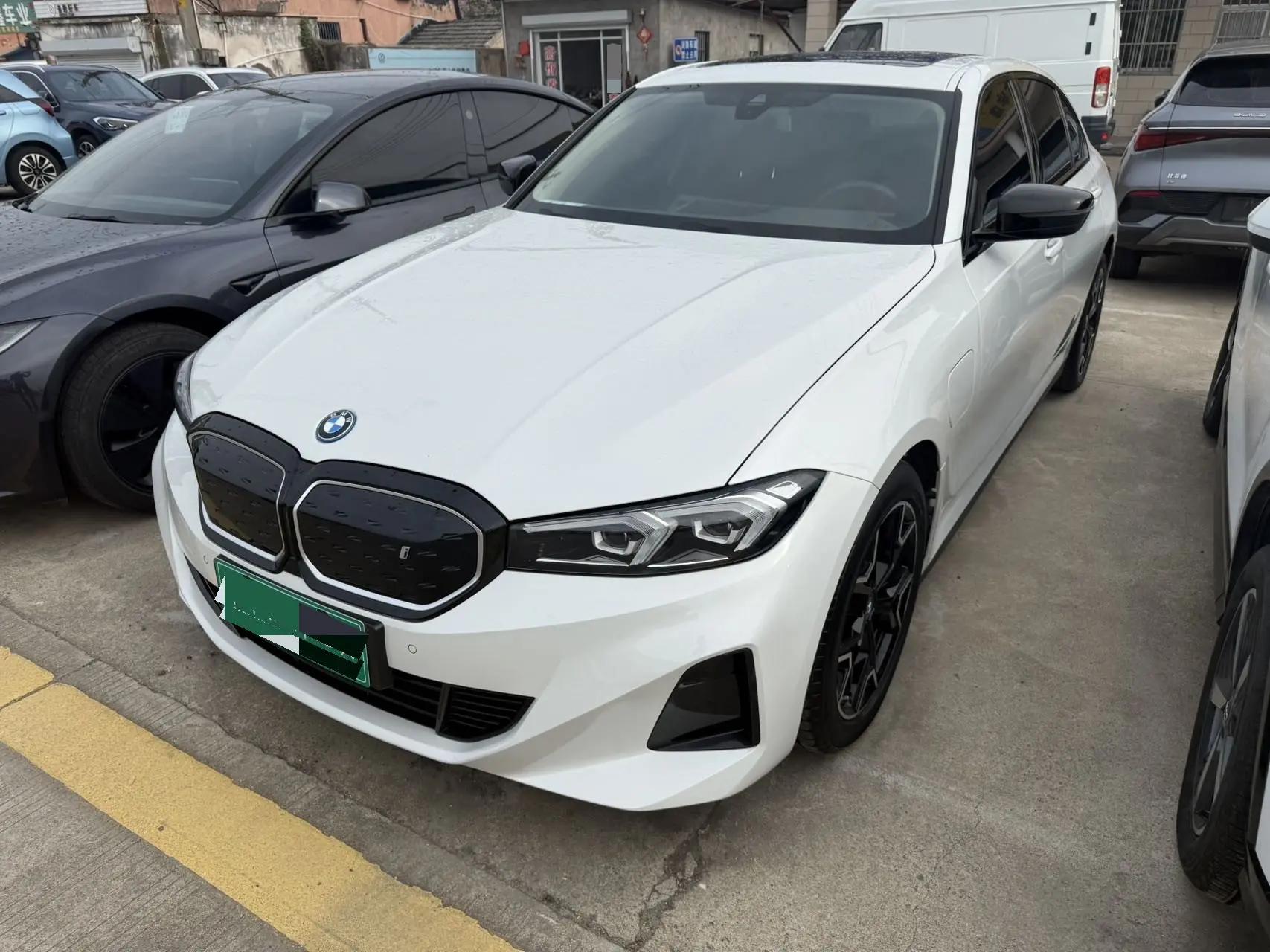BMW 2023 i3 eDrive 40 L obsidian night suit automatic gear
